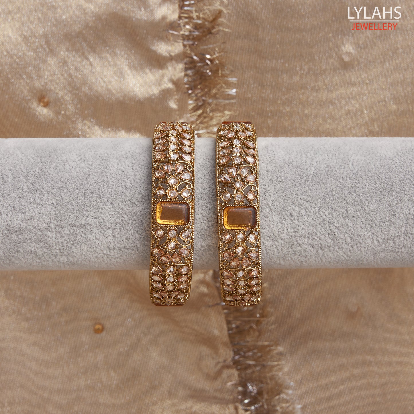 Gold pair of Karas with yellow stone from Lylahs Jewellery