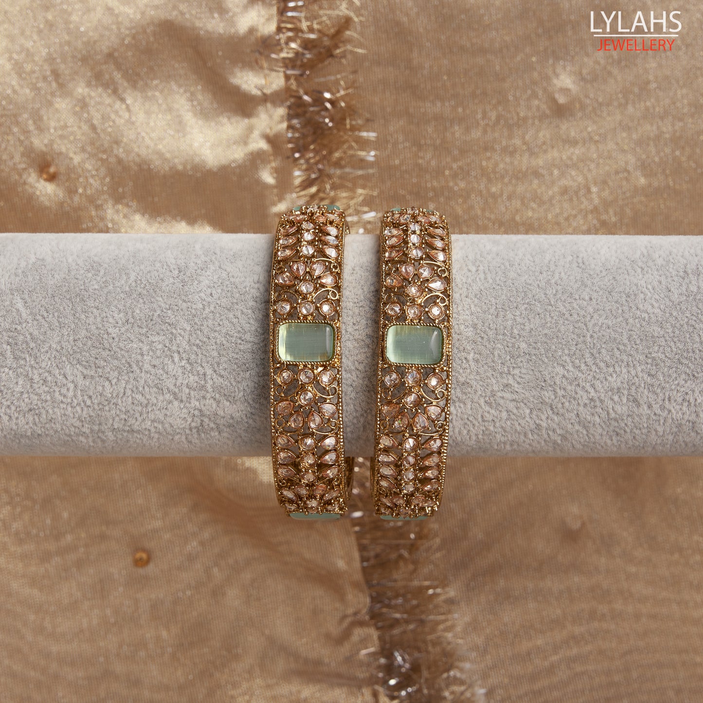 Gold pair of Karas with mint stone from Lylahs Jewellery