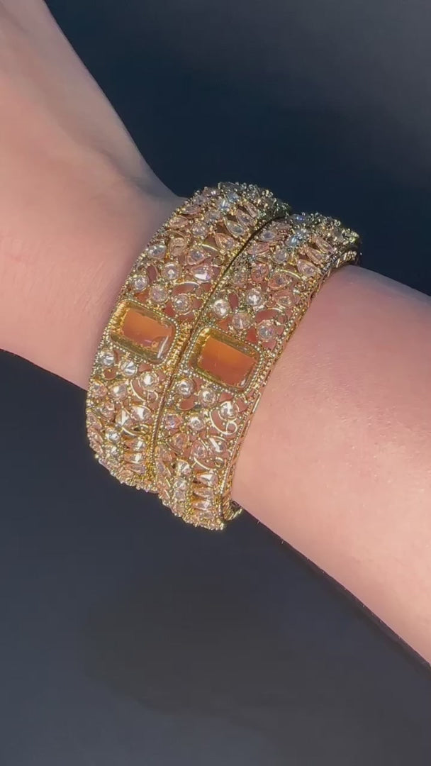 Gold pair of Karas with gold stone from Lylahs Jewellery - Close Up Video 