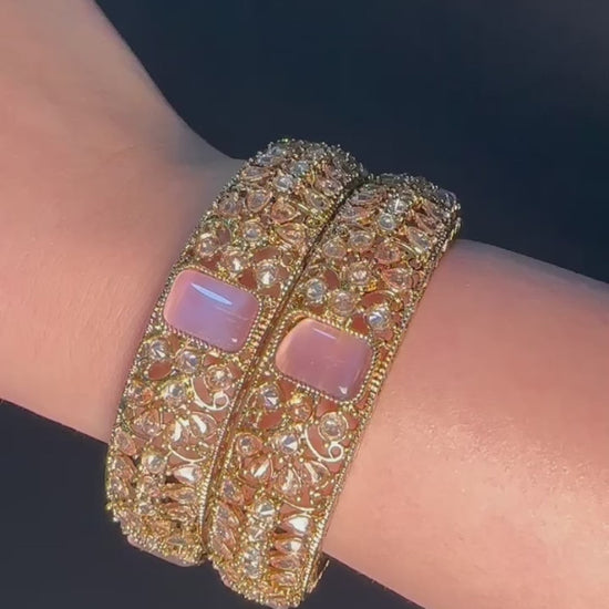 Gold pair of Karas with pink stone from Lylahs Jewellery - Close Up Video 