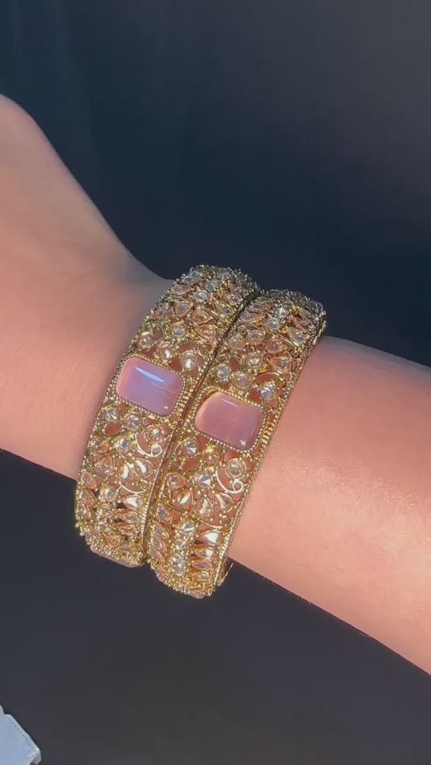 Gold pair of Karas with pink stone from Lylahs Jewellery - Close Up Video 