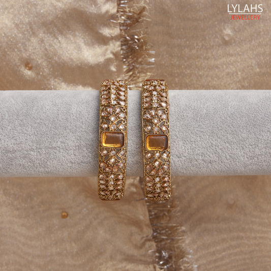 Gold pair of Karas with yellow stone from Lylahs Jewellery