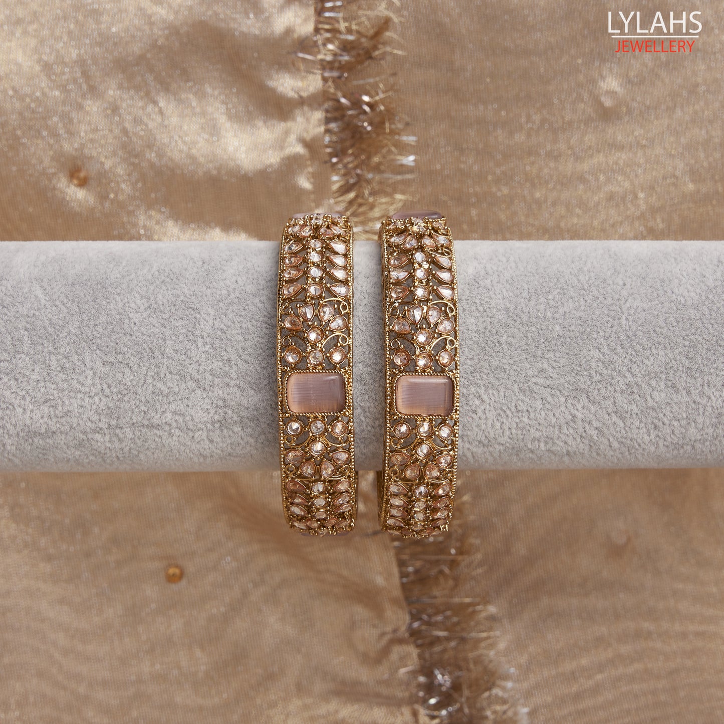 Gold pair of Karas with lilac stone from Lylahs Jewllery