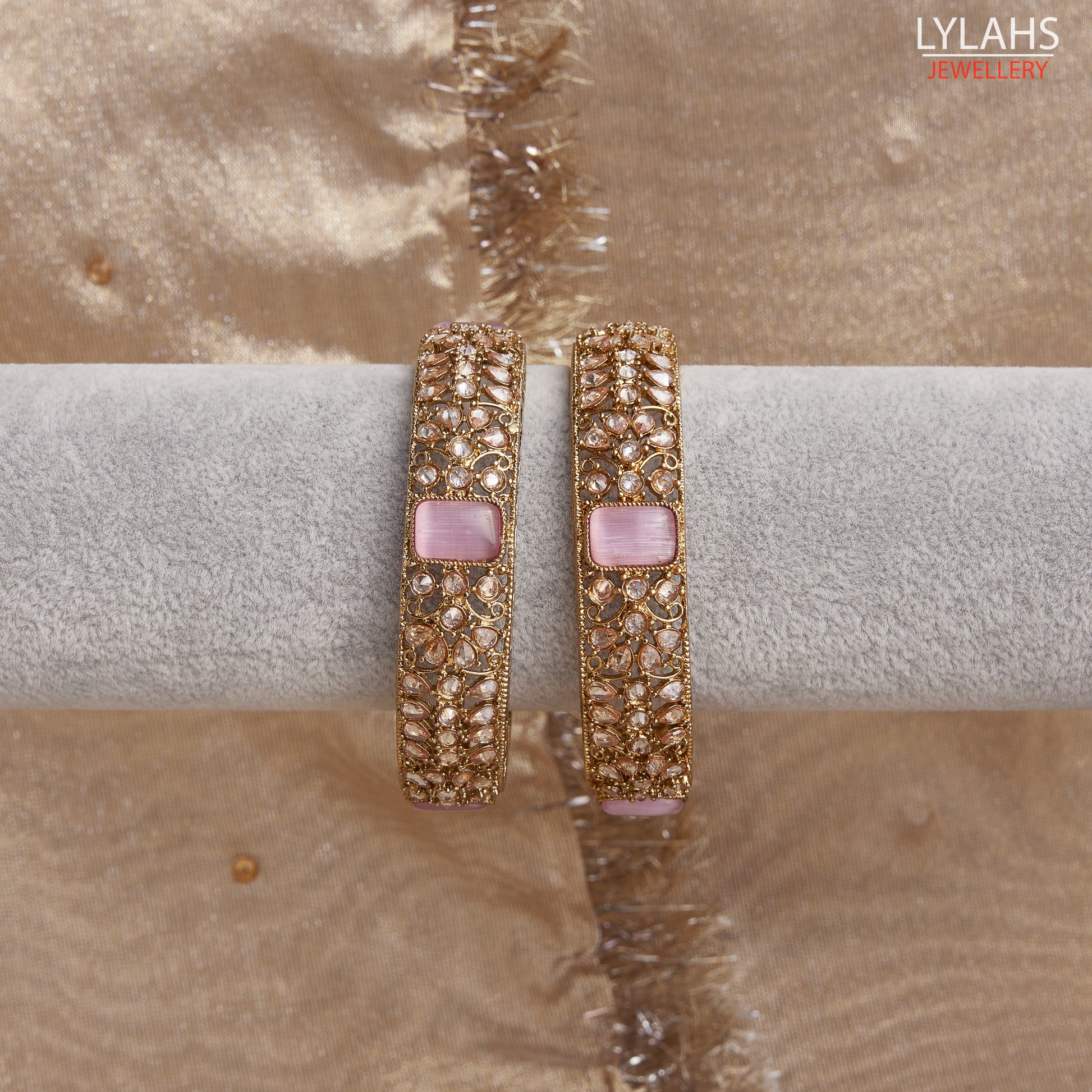 Gold pair of Karas with pink stone from Lylahs Jewllery