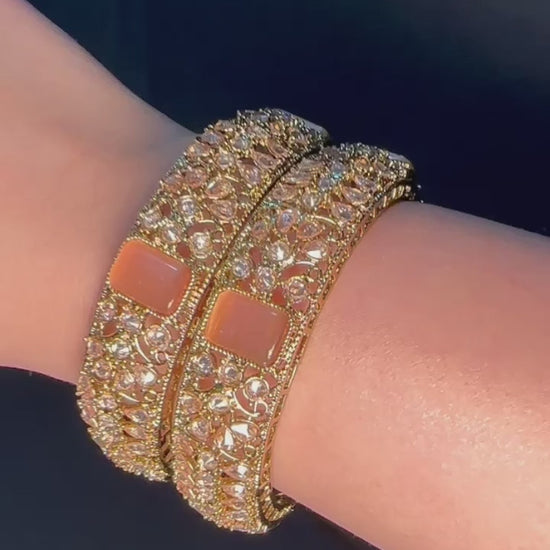 Gold pair of Karas with peach stone from Lylahs Jewellery - Close Up Video 
